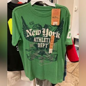 Green Urban Pipeline graphic T-shirt with text “New York Athletic Dept.”